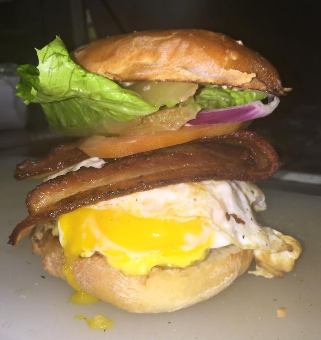 Burger with a fried egg and bacon